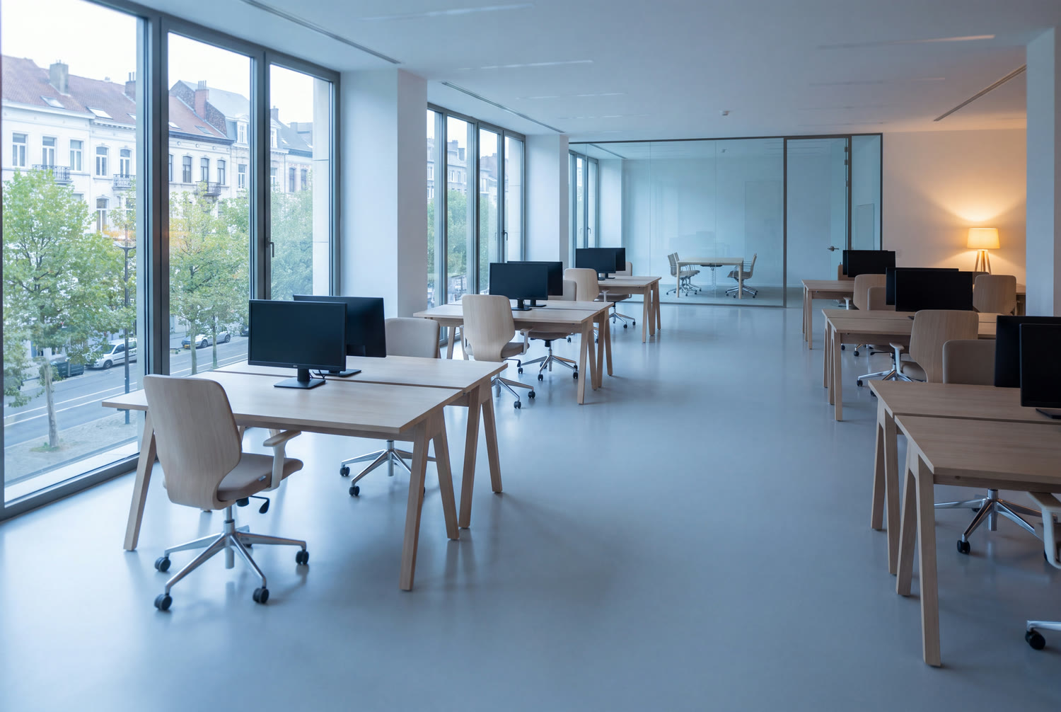 Spotless office floor at daybreak on avenue Louise, desks cleared and floor without streaks